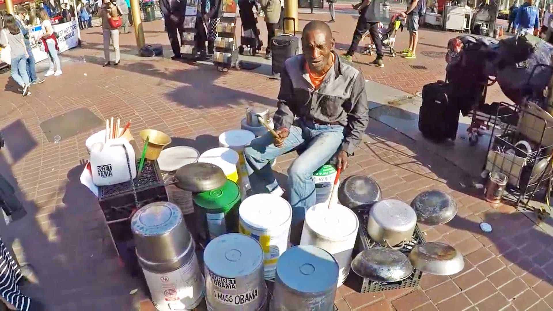 The "Bucket Man" Larry Hunt playing in the sidewalks of San Francisco.