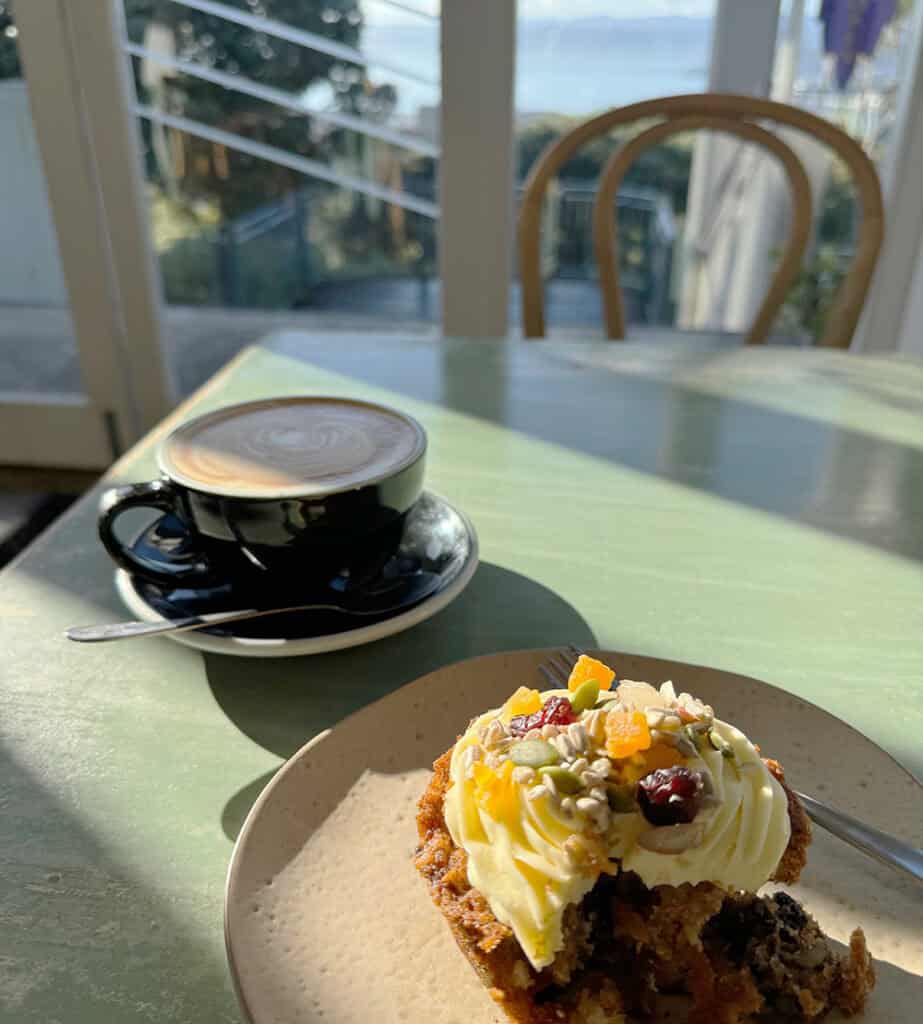Muffin and flat white in cafe
