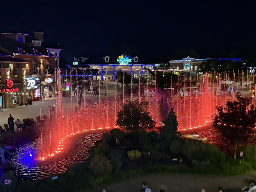 The nightly Margaritaville Island water and light show from the rooftop bar